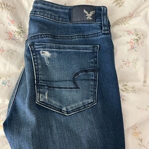 Women's Distressed Blue Jeans
